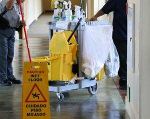 Janitor Cart being pulled by Janitorial Services in Miami