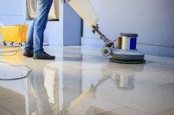 Man Using Floor Polisher on Tile Floor for Janitorial Service in Coral Gables, FL 