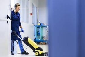 Woman Cleaning Floors for an Office Cleaning Services in Fort Lauderdale, FL