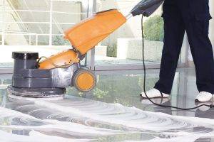 Floor Cleaning Company polishing floors with machine in Fort Lauderdale, FL
